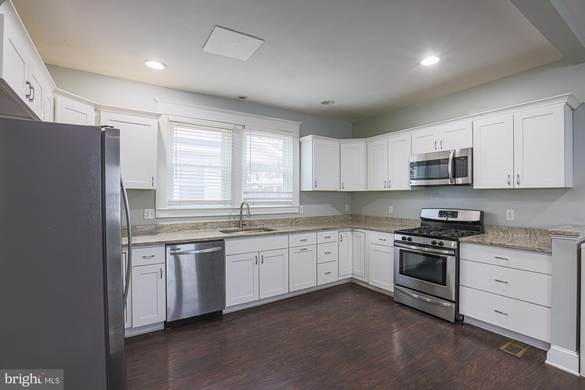 8 Irving Place Baltimore, MD 21208 - Photo 7 of 25 Modern kitchen with sleek finishes.