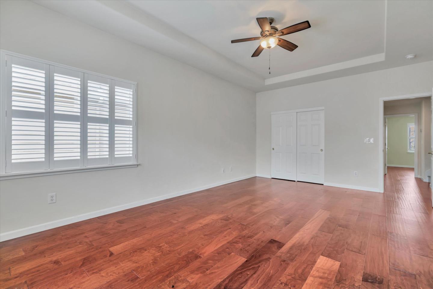 5175 Trinity Park Drive Alviso, CA 95002 - Photo 14 of 24 wooden floor in an empty room with a window
