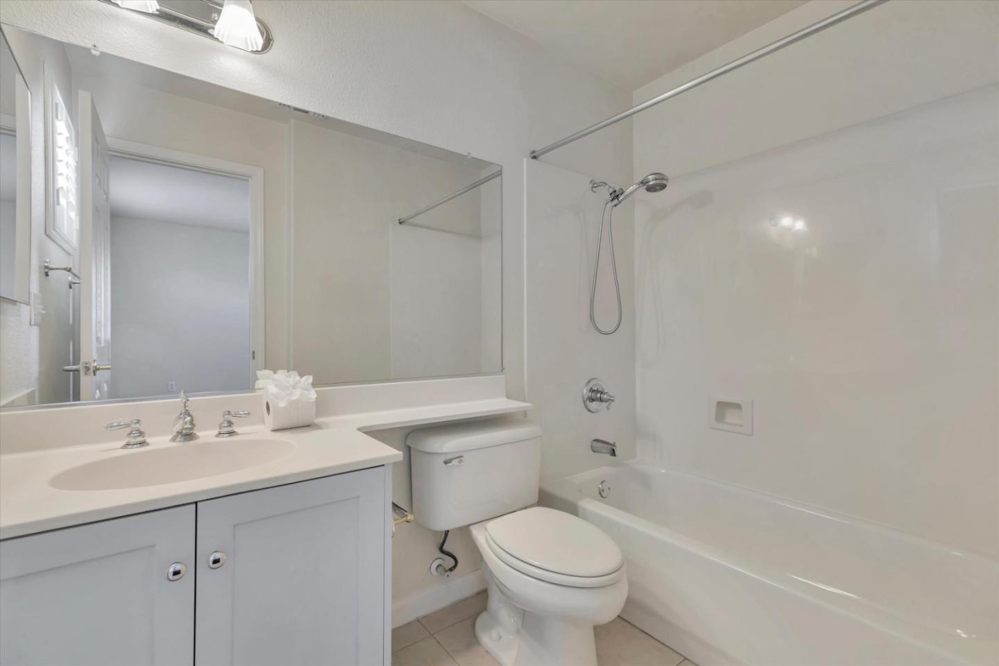 5175 Trinity Park Drive Alviso, CA 95002 - Photo 20 of 24 a bathroom with a sink toilet and shower