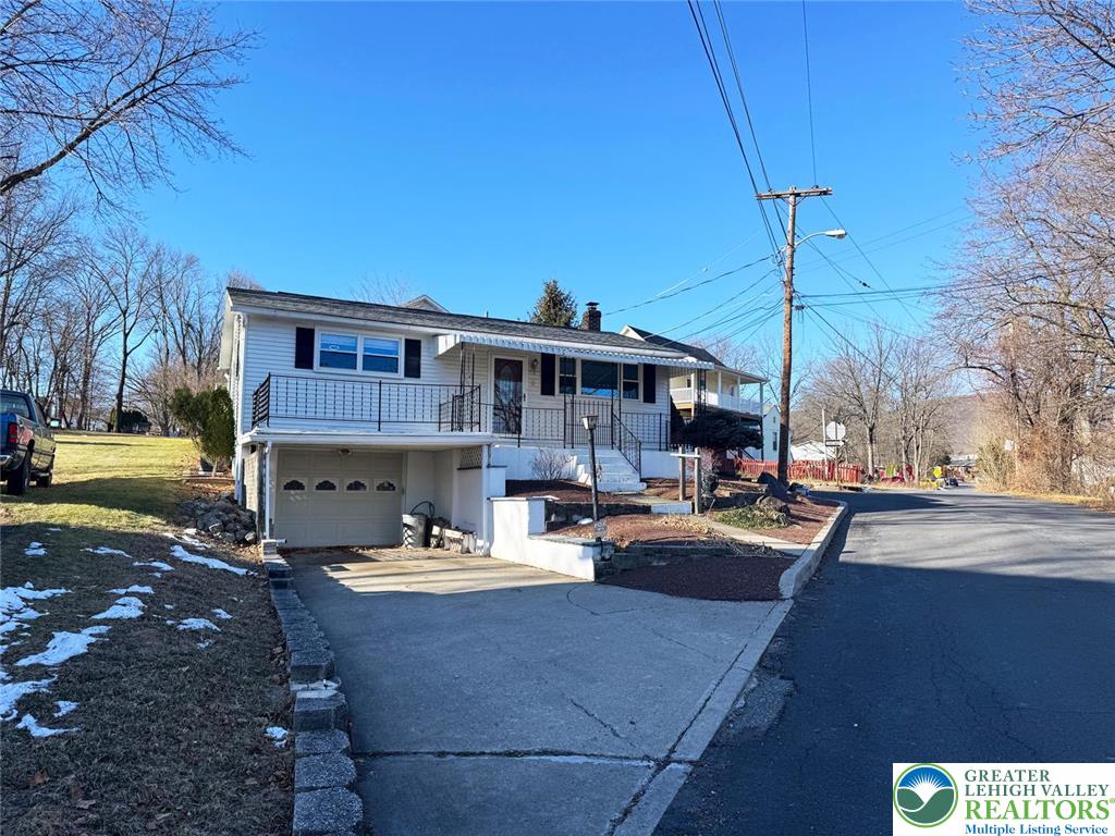 9 Jewel Street Roseto, PA 18013 - Photo 2 of 25 a view of a house with backyard water fountain and sitting area