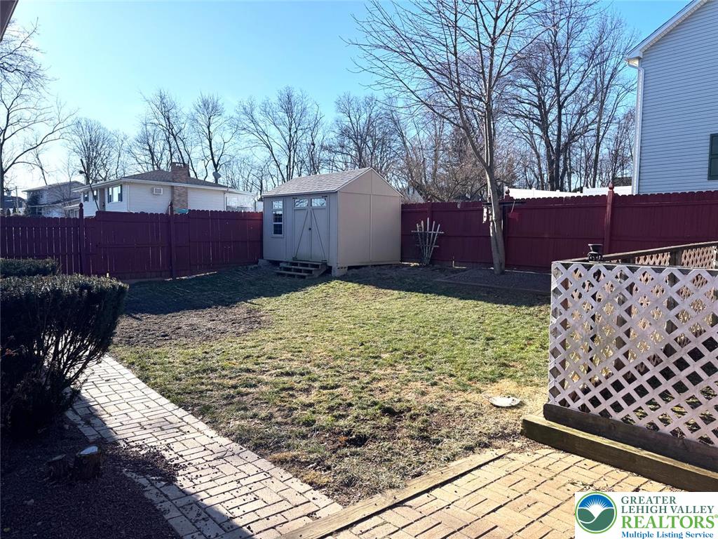 9 Jewel Street Roseto, PA 18013 - Photo 6 of 25 a view of a yard with chairs and wooden fence