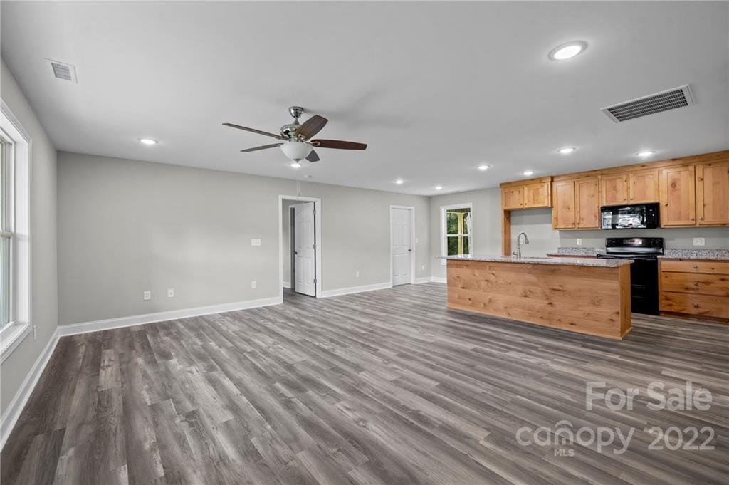 3840 Turner Road Clover, SC 29710 - Photo 16 of 28 a view of kitchen with sink and wooden floor