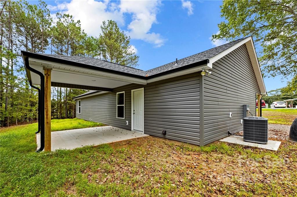 3840 Turner Road Clover, SC 29710 - Photo 26 of 28 a view of a house with backyard and porch