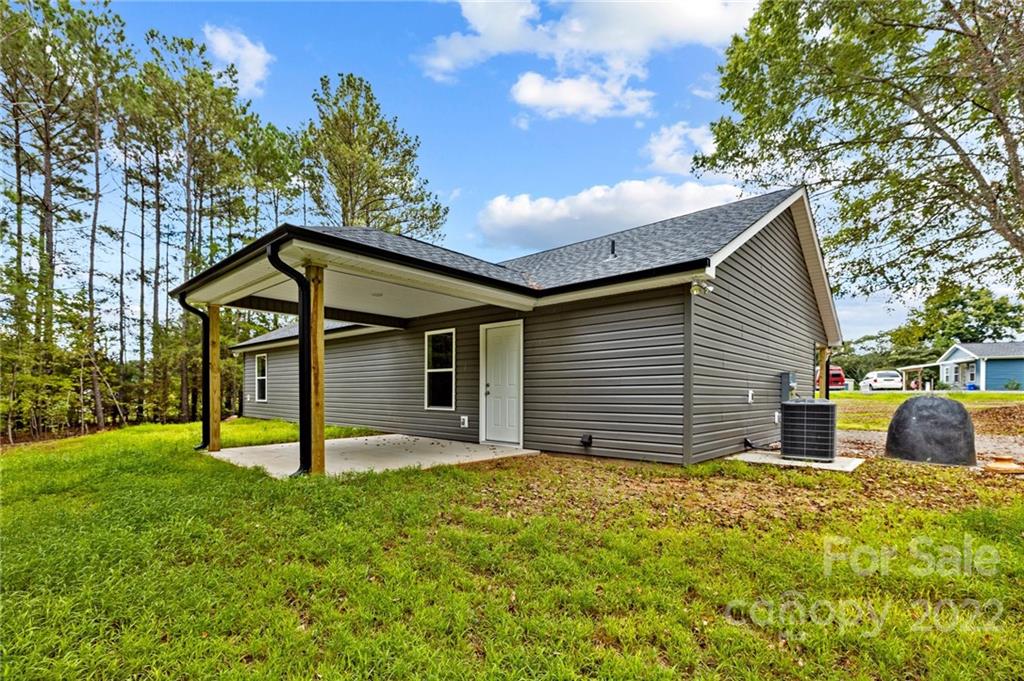 3840 Turner Road Clover, SC 29710 - Photo 28 of 28 a house that has a lot of windows in it