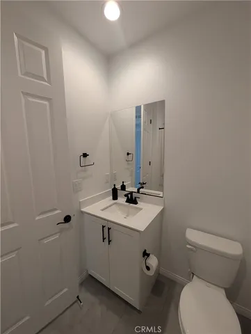 a view of swimming pool with outdoor seating and city view