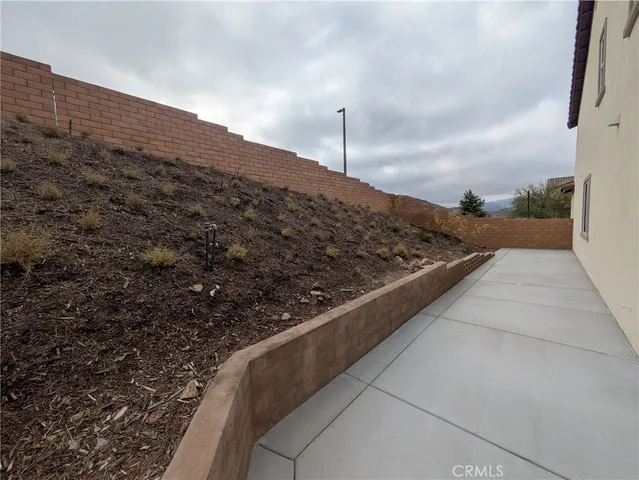 a picture of city view with sitting space and garden