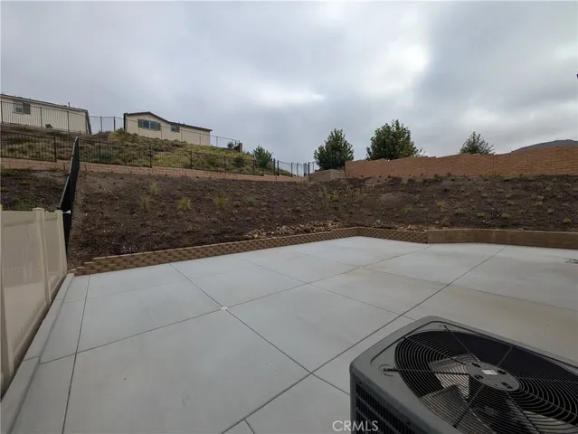 a view of an empty room with a stove