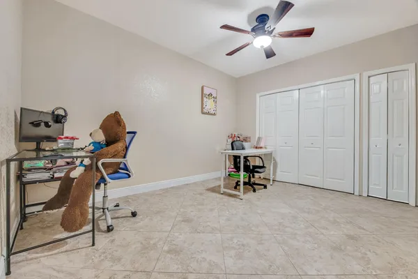 a view of a workspace with furniture