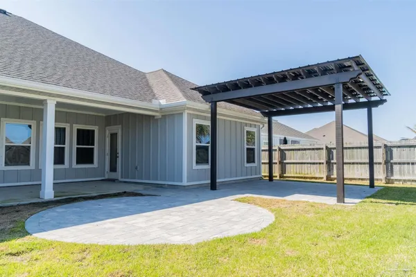 swimming pool view with a seating space