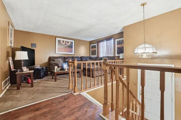 a view of a living room and dining room