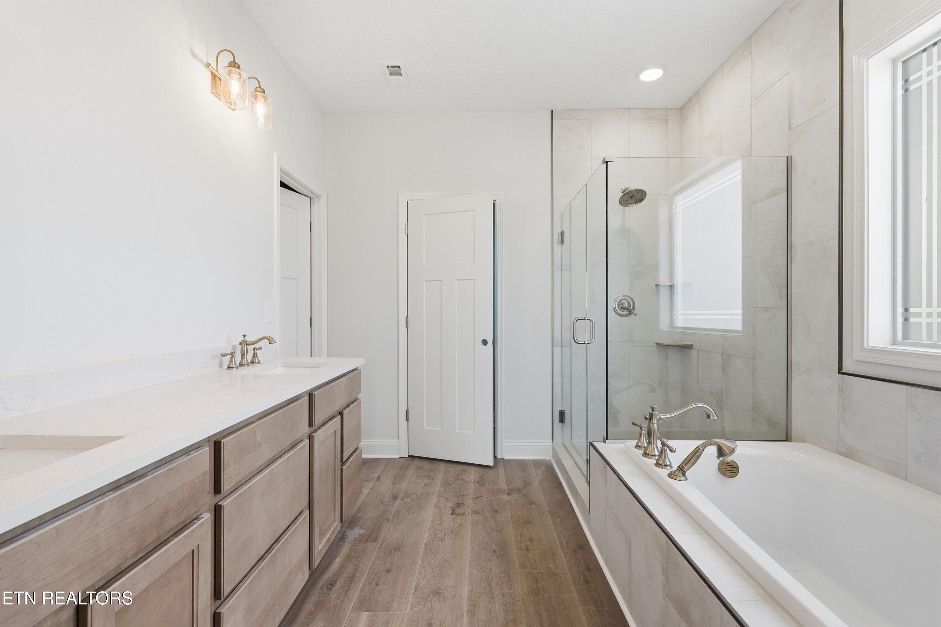 1885 Hickory Reserve Road Knoxville, TN 37932 - Photo 12 of 23 Primary Suite / Bath 1