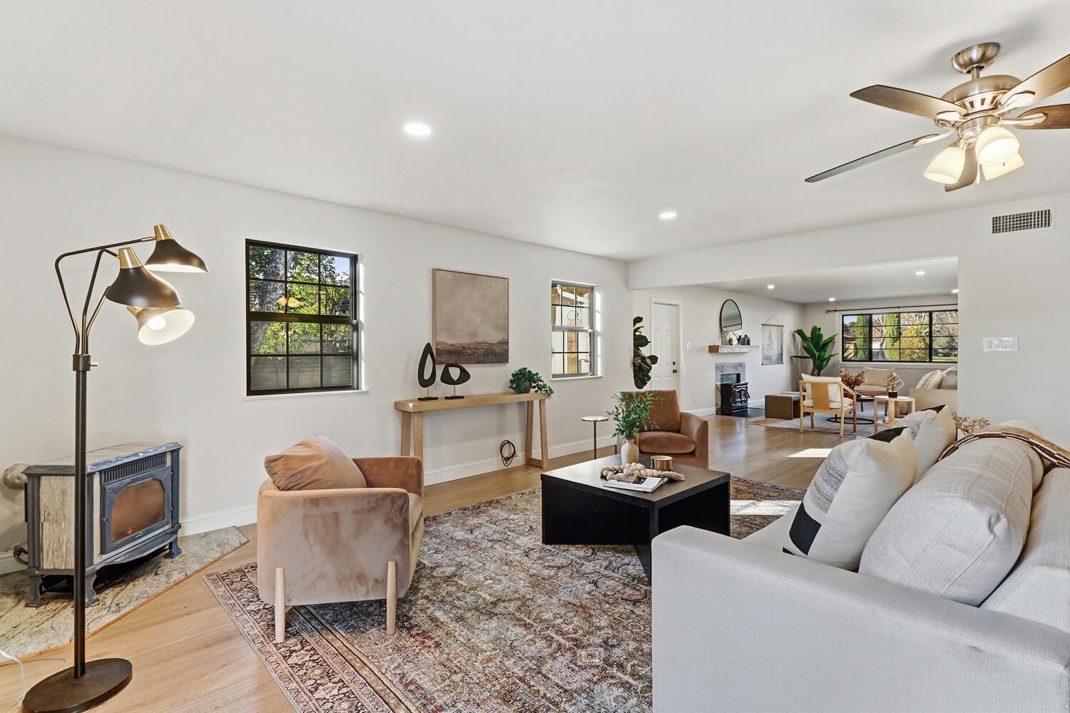 2860 Tioga Way Sacramento, CA 95821 - Photo 11 of 53 a living room with fireplace furniture and a flat screen tv