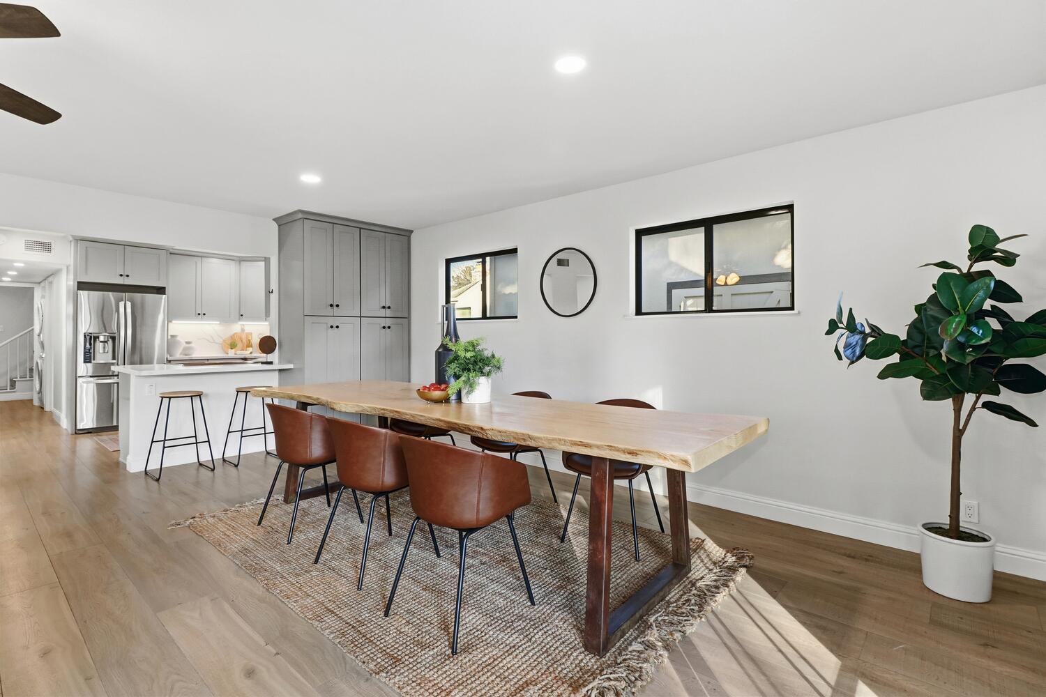 2860 Tioga Way Sacramento, CA 95821 - Photo 17 of 53 a view of a dining room with furniture and wooden floor