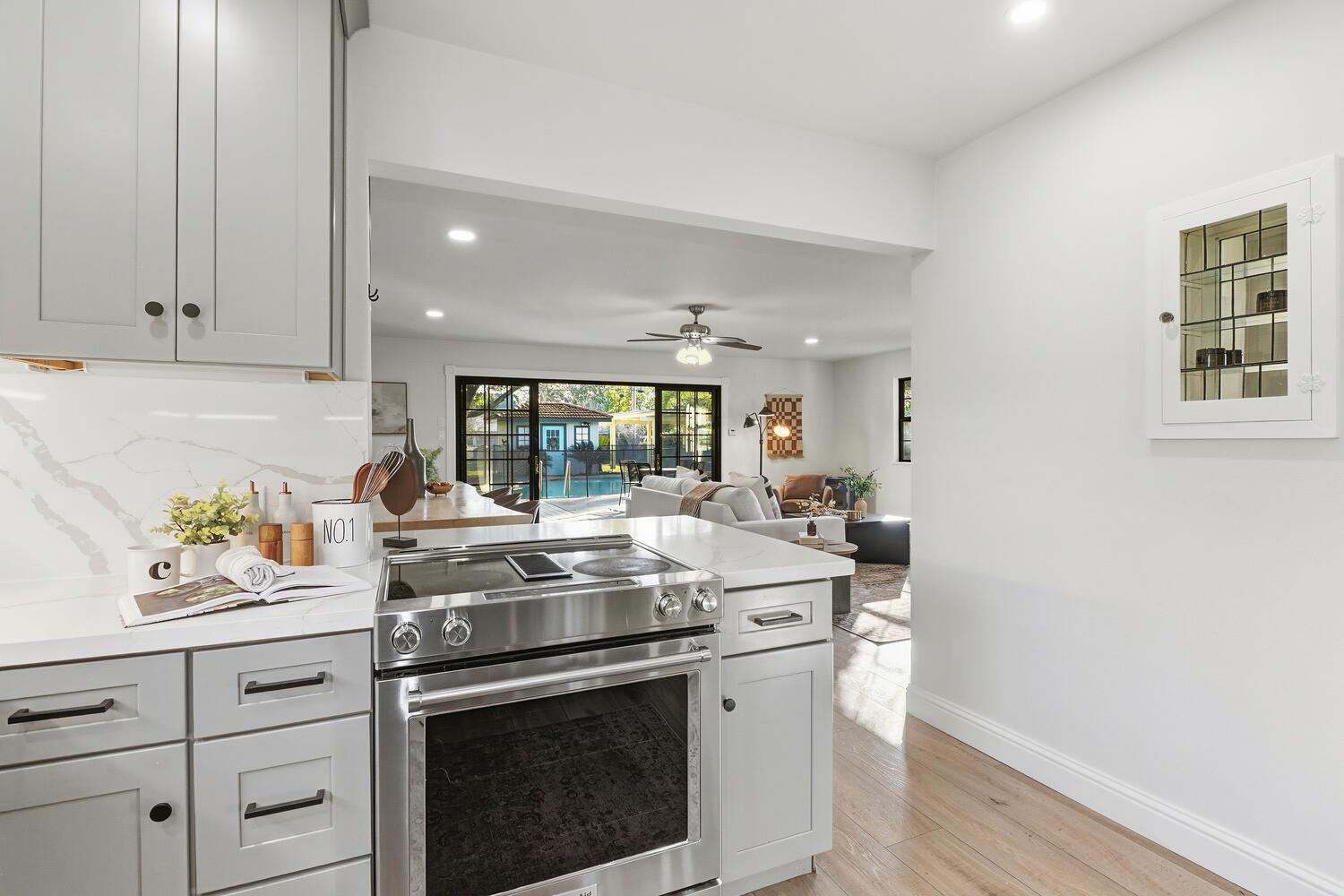 2860 Tioga Way Sacramento, CA 95821 - Photo 20 of 53 a kitchen with a stove and cabinets