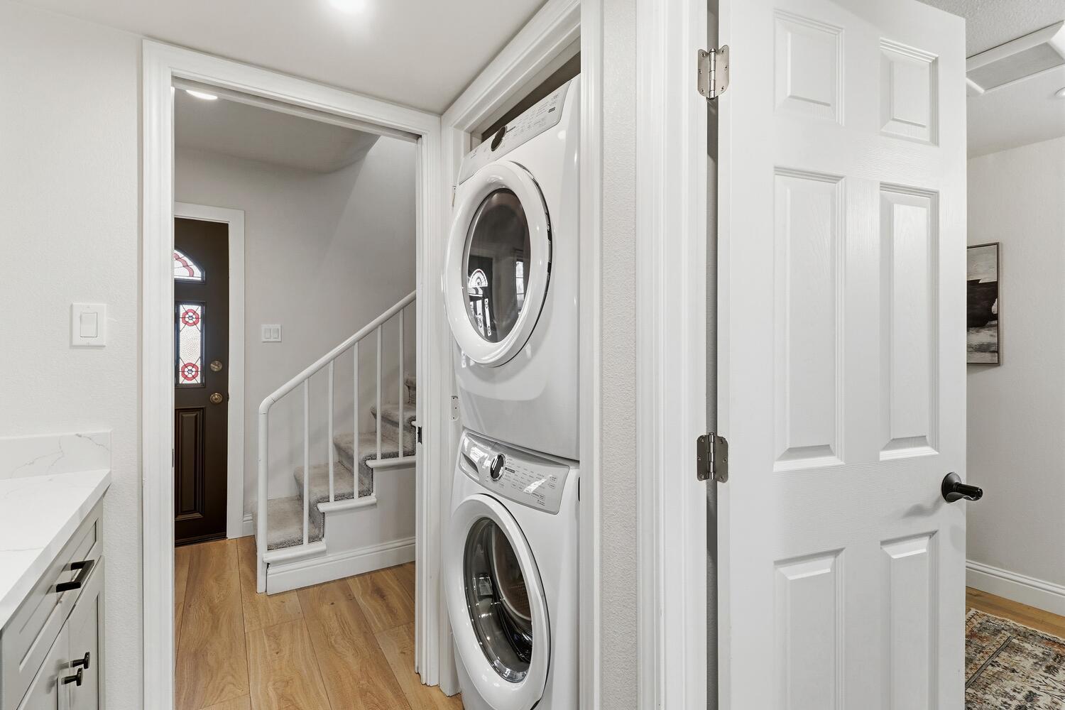 2860 Tioga Way Sacramento, CA 95821 - Photo 23 of 53 a view of a hallway with washer and dryer
