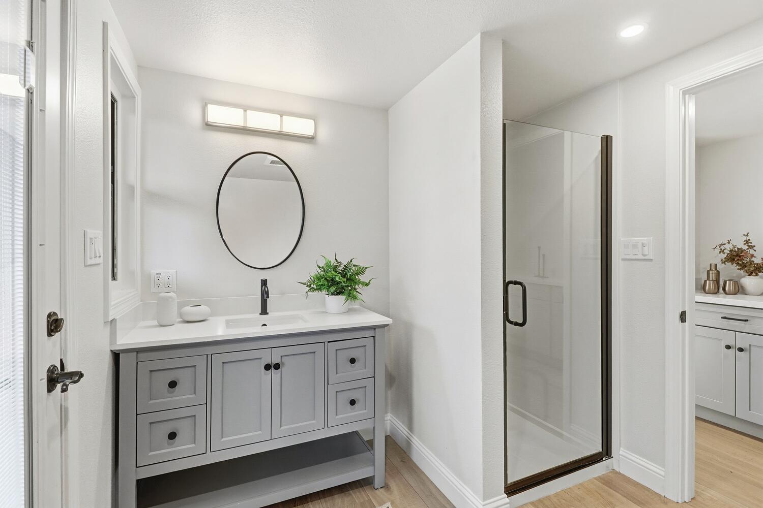 2860 Tioga Way Sacramento, CA 95821 - Photo 24 of 53 a bathroom with a double vanity sink mirror and toilet