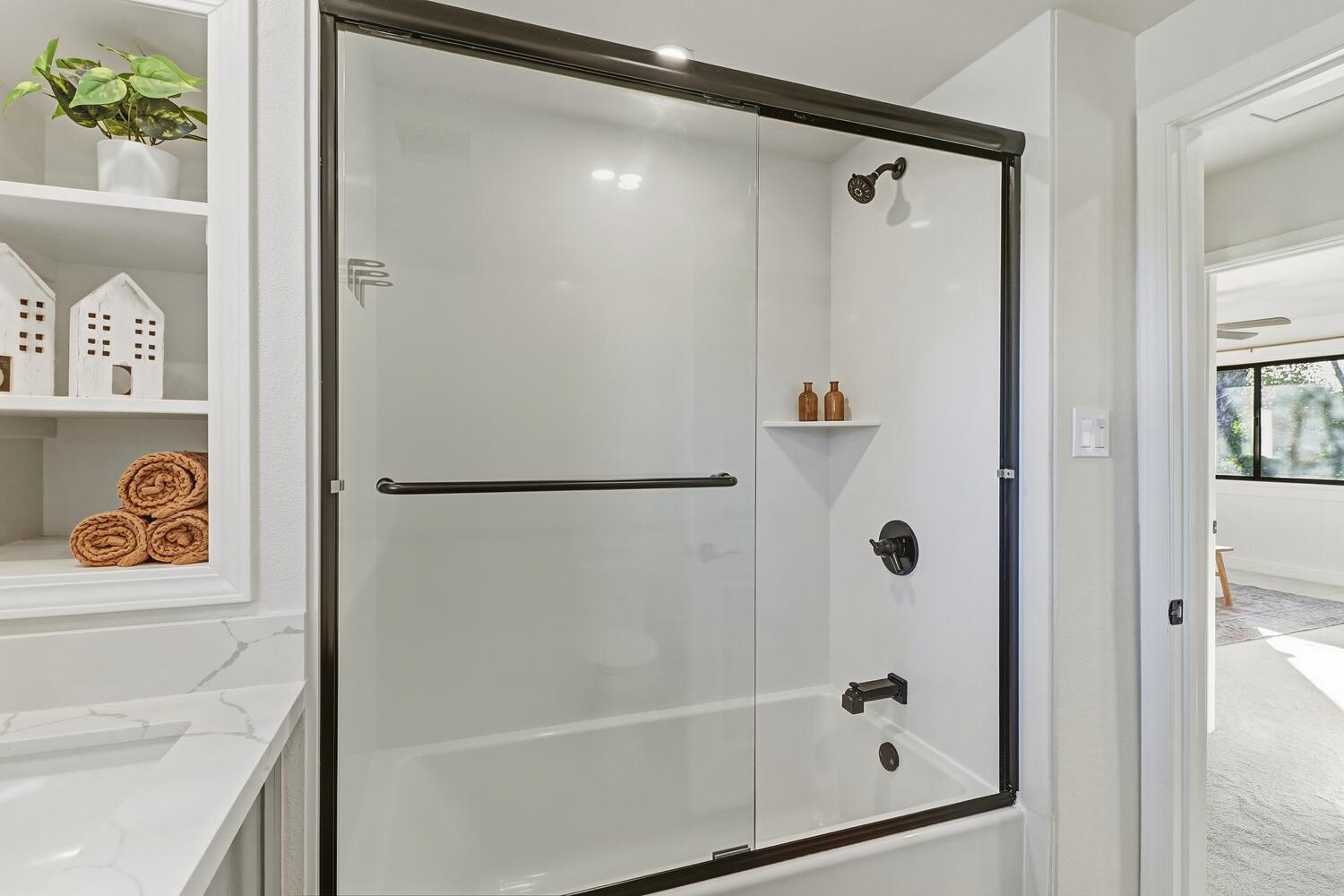 2860 Tioga Way Sacramento, CA 95821 - Photo 28 of 53 a bathroom with a shower and a sink