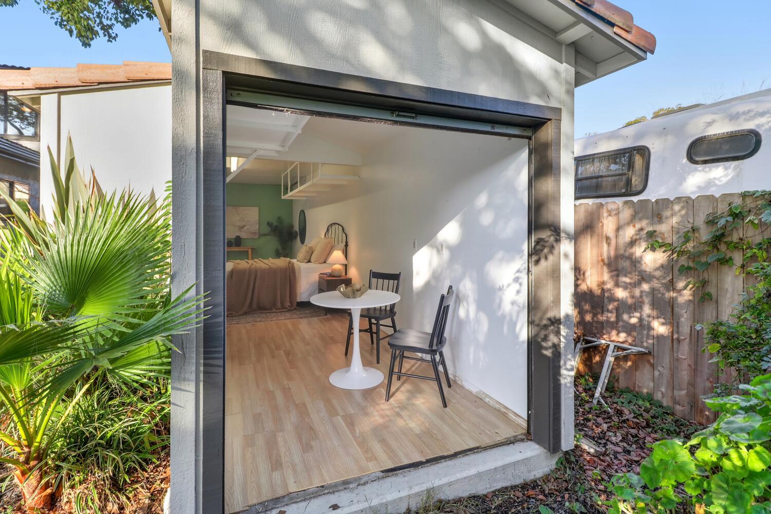 2860 Tioga Way Sacramento, CA 95821 - Photo 34 of 53 a view of a porch with chairs and potted plants