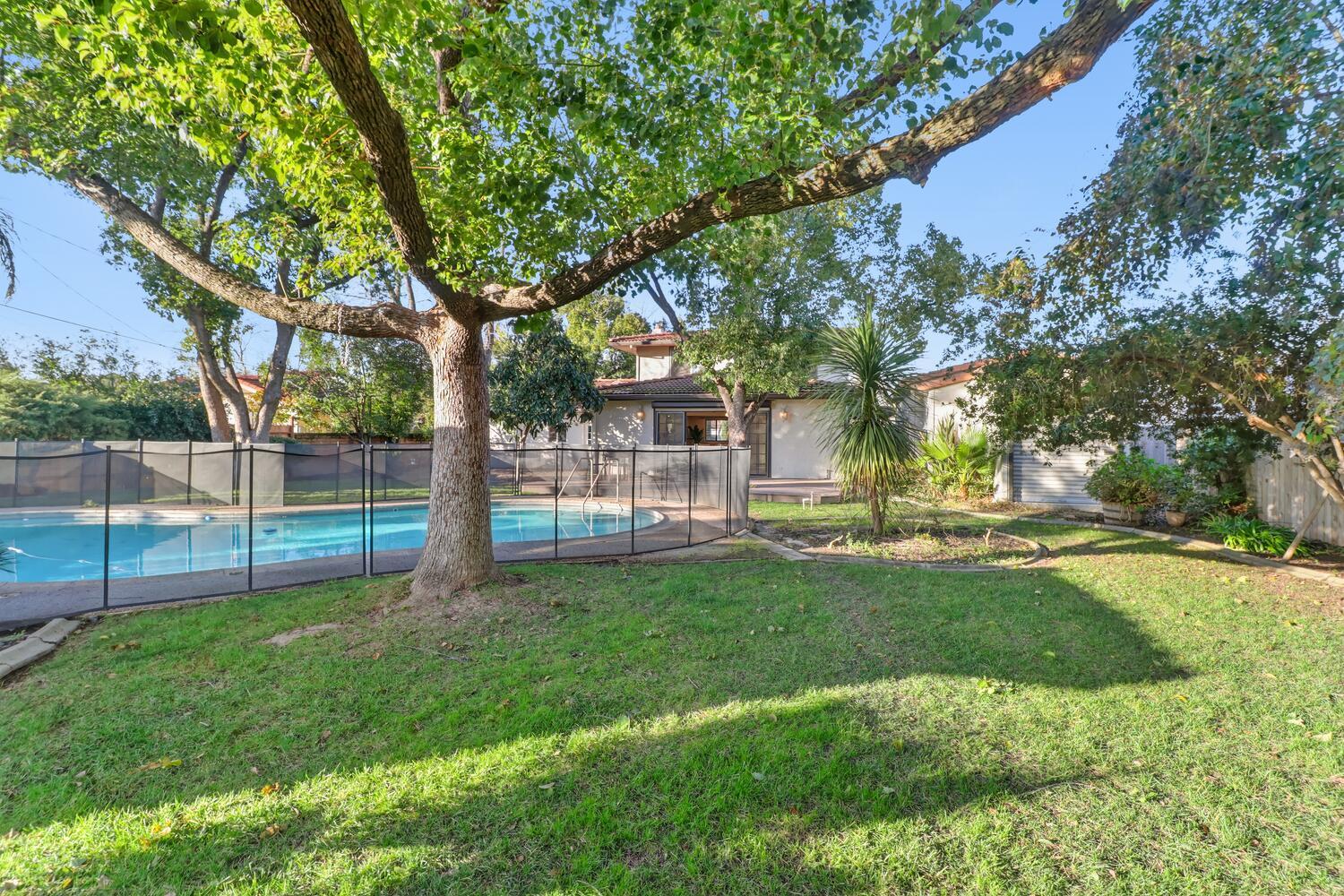 2860 Tioga Way Sacramento, CA 95821 - Photo 45 of 53 a view of a park with large trees