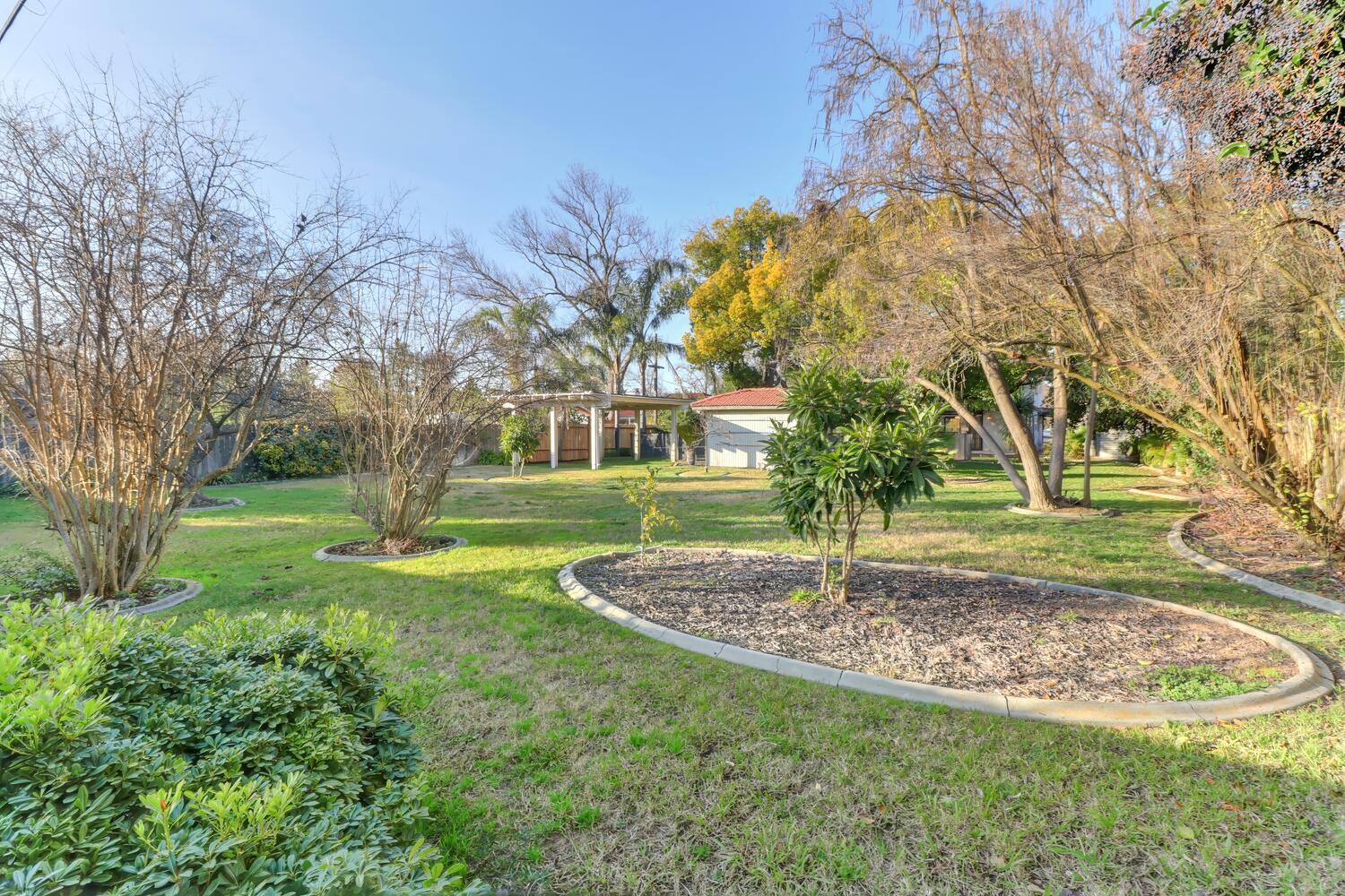 2860 Tioga Way Sacramento, CA 95821 - Photo 46 of 53 a view of a house with a yard