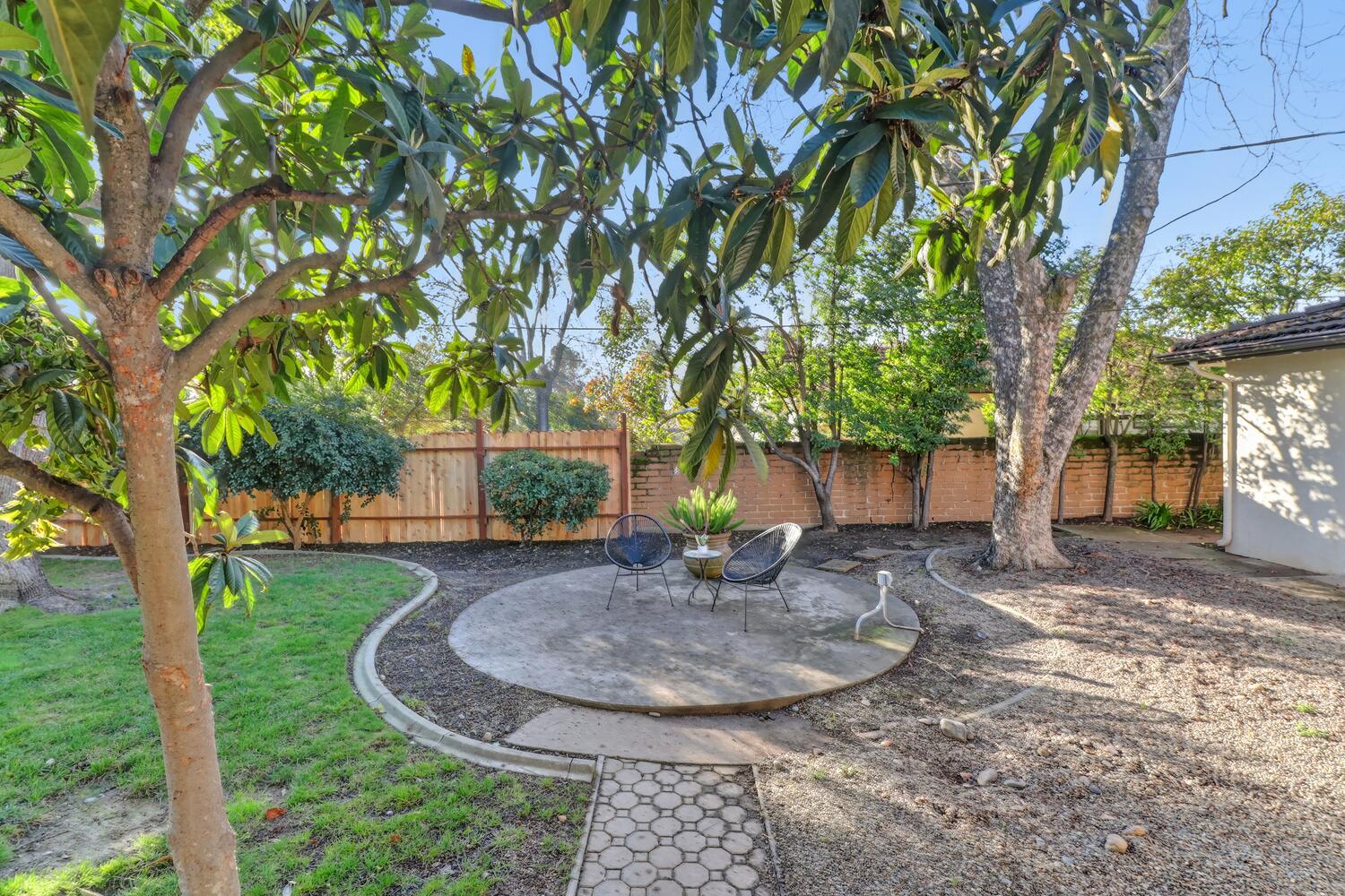 2860 Tioga Way Sacramento, CA 95821 - Photo 47 of 53 a view of a backyard with large trees