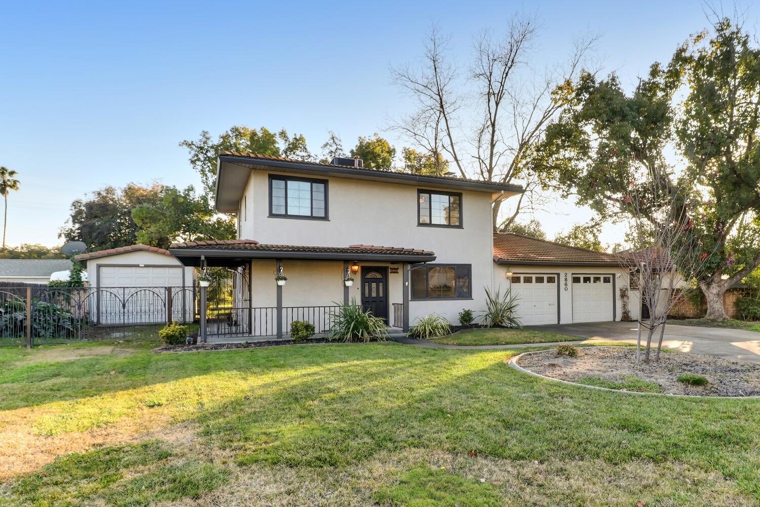 2860 Tioga Way Sacramento, CA 95821 - Photo 50 of 53 a view of a house with a big yard and large tree