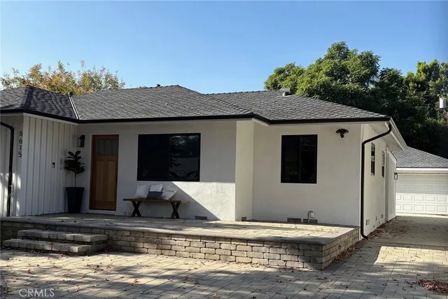 a view of a house with a patio