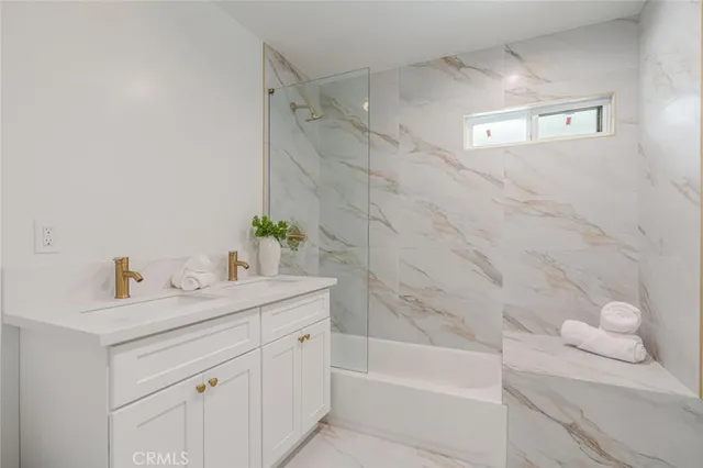 a bed room with a bed and a couch