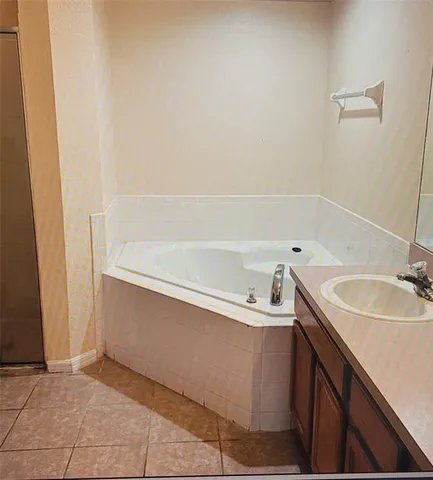 a bathroom with a sink and a bathtub