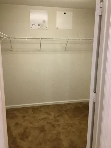 a view of a livingroom with wooden floor