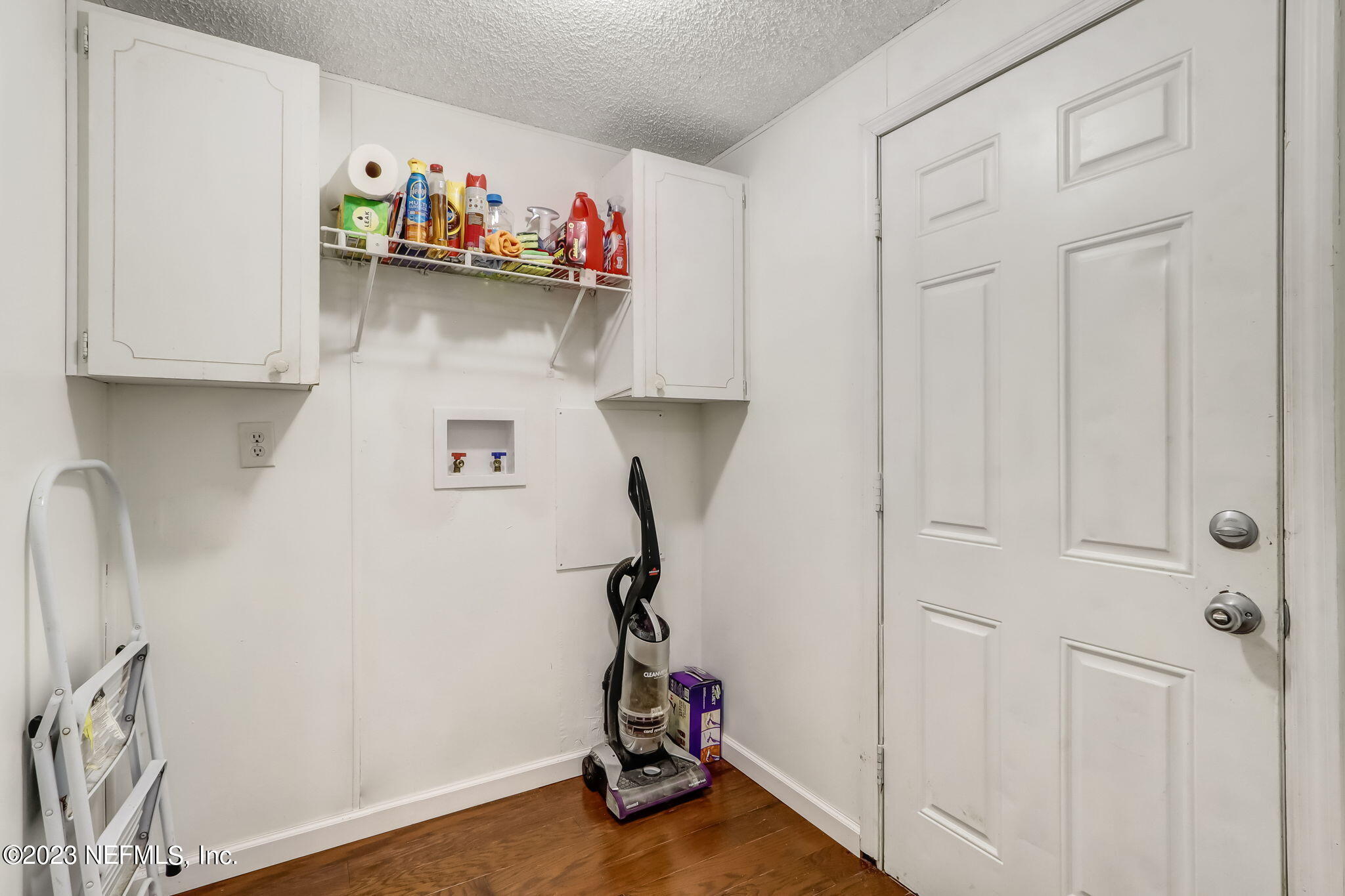 11480 Kaleel Road Jacksonville, FL 32218 - Photo 28 of 31 a view of kids room with clothes and shoes