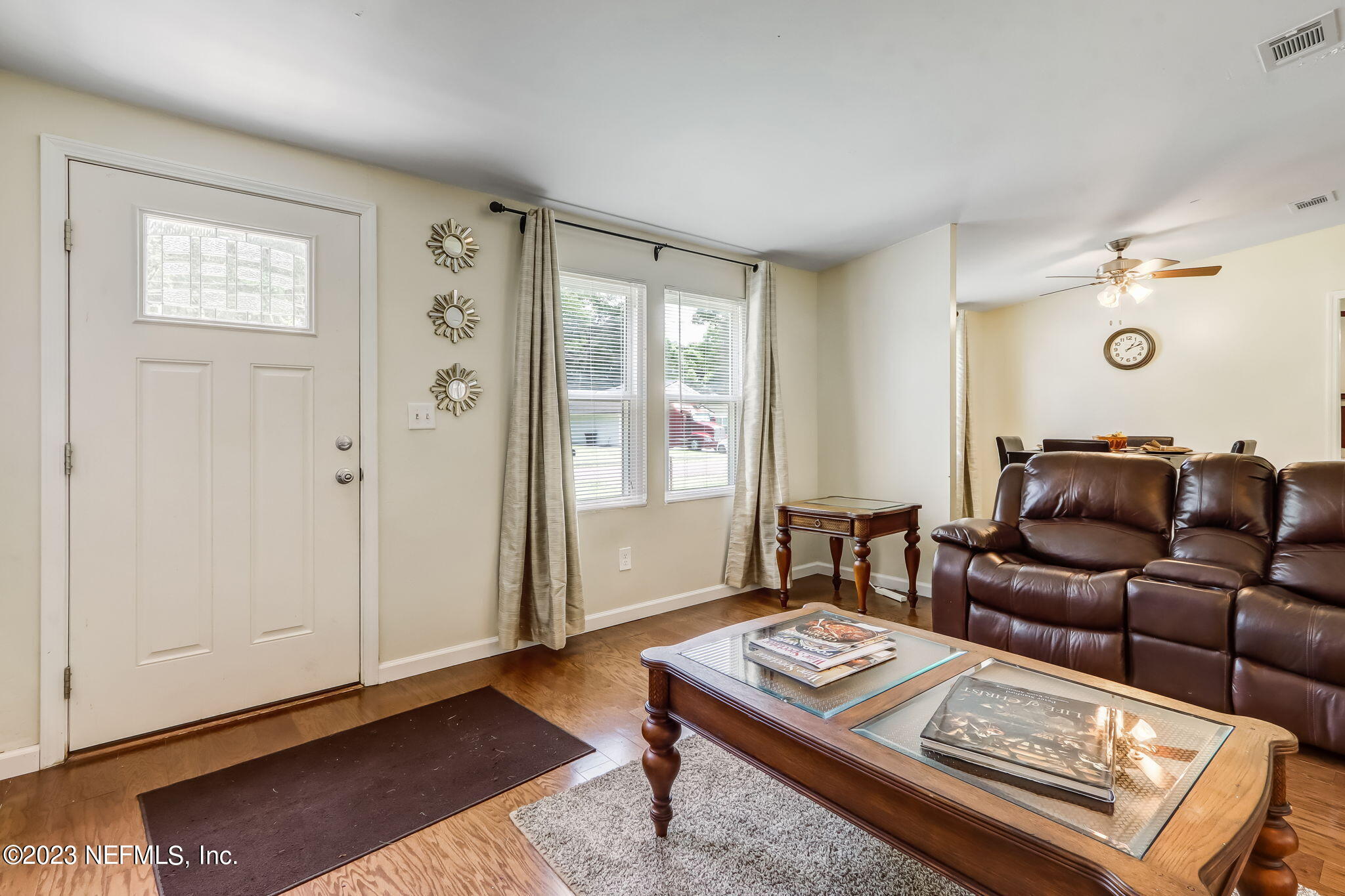 11480 Kaleel Road Jacksonville, FL 32218 - Photo 5 of 31 a living room with furniture and a window