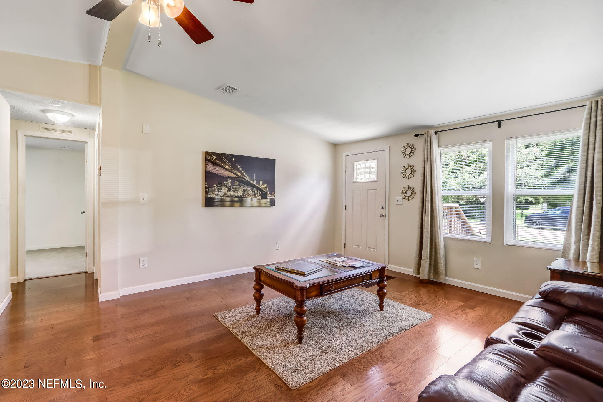 11480 Kaleel Road Jacksonville, FL 32218 - Photo 8 of 31 a living room with furniture and a window