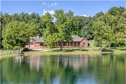 284 Northup Road Portland, TN 37148 - Photo 1 of 30 a view of a lake with houses