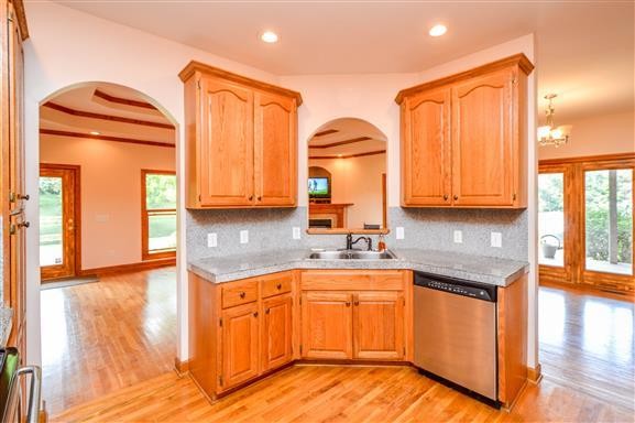 284 Northup Road Portland, TN 37148 - Photo 8 of 30 a kitchen with a sink cabinets and wooden floor