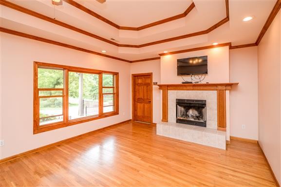 284 Northup Road Portland, TN 37148 - Photo 10 of 30 a view of an empty room with a fireplace and a window