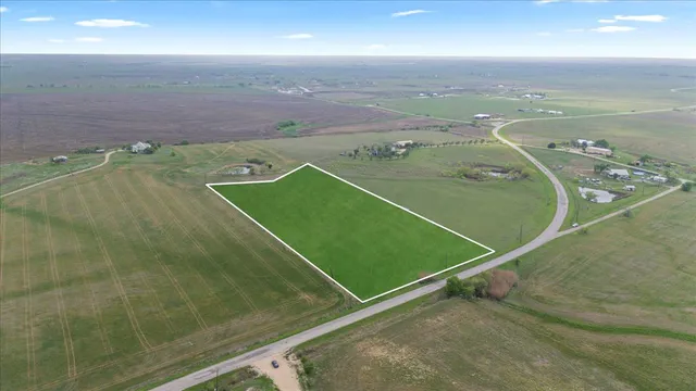 a view of a swimming pool and an outdoor space