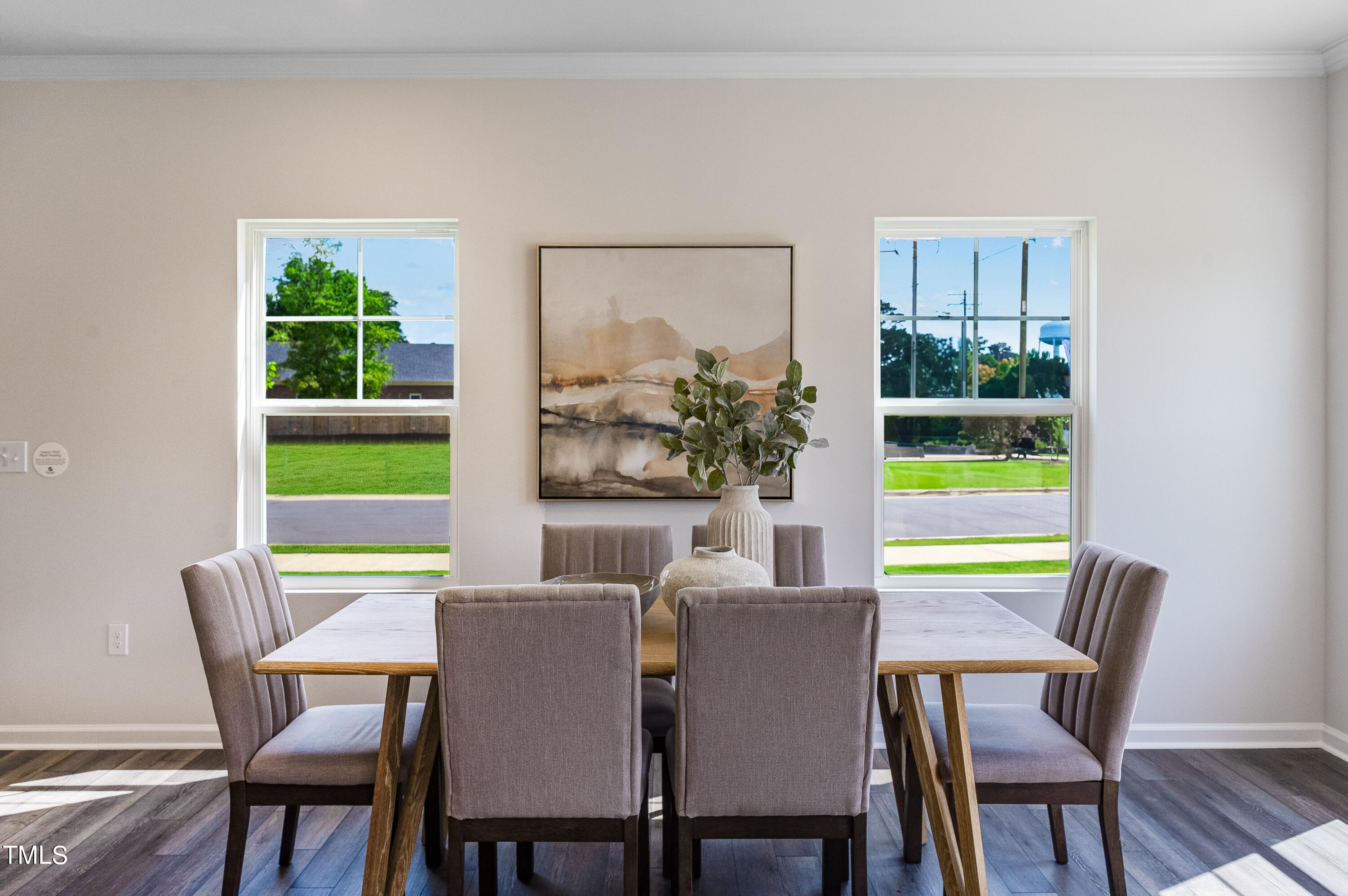 273 Paramount Drive Smithfield, NC 27577 - Photo 26 of 29 a view of a dining room with furniture window and wooden floor