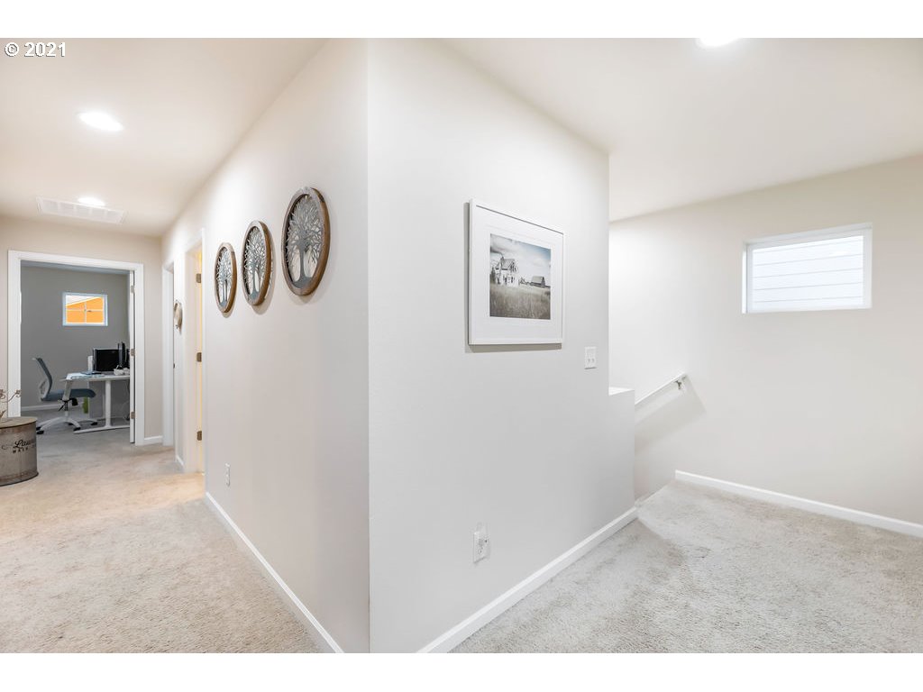3512 North 10th Street Ridgefield, WA 98642 - Photo 12 of 23 a very nice looking room with a large tree