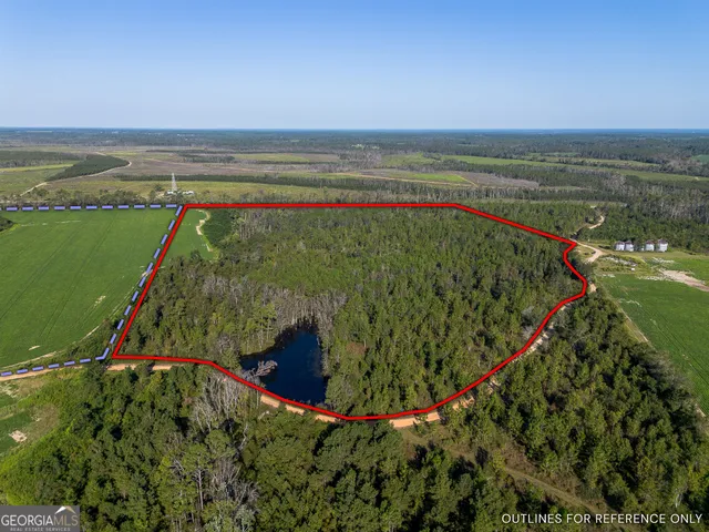 a view of a green field with a ground