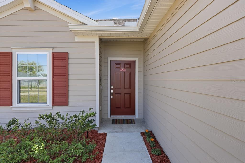 511 Northwest 4th Street Williston, FL 32696 - Photo 3 of 33 a view of front door of house