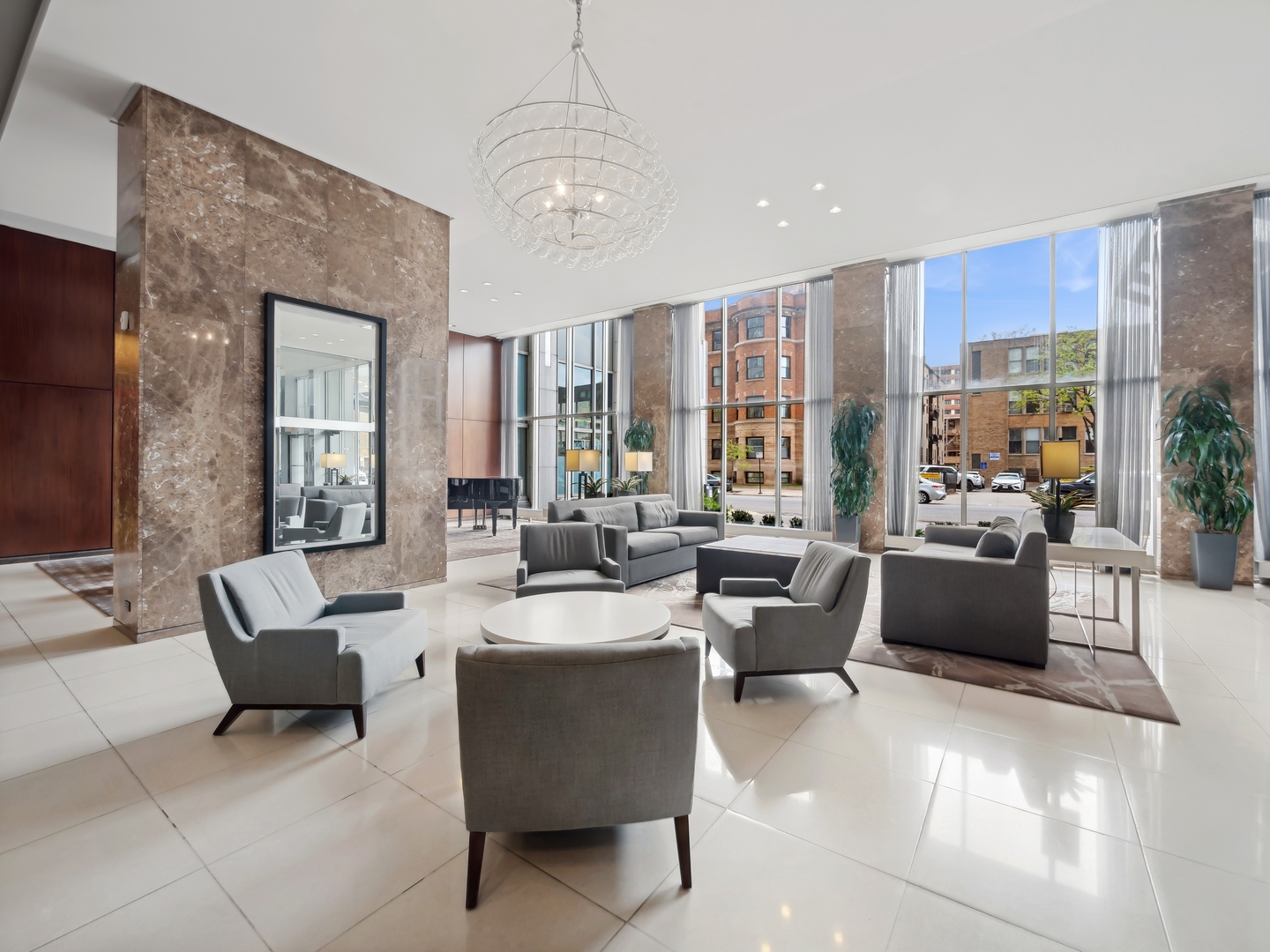 655 West Irving Park Road, Unit 3305 Chicago, IL 60613 - Photo 11 of 14 a living room with furniture and a large window