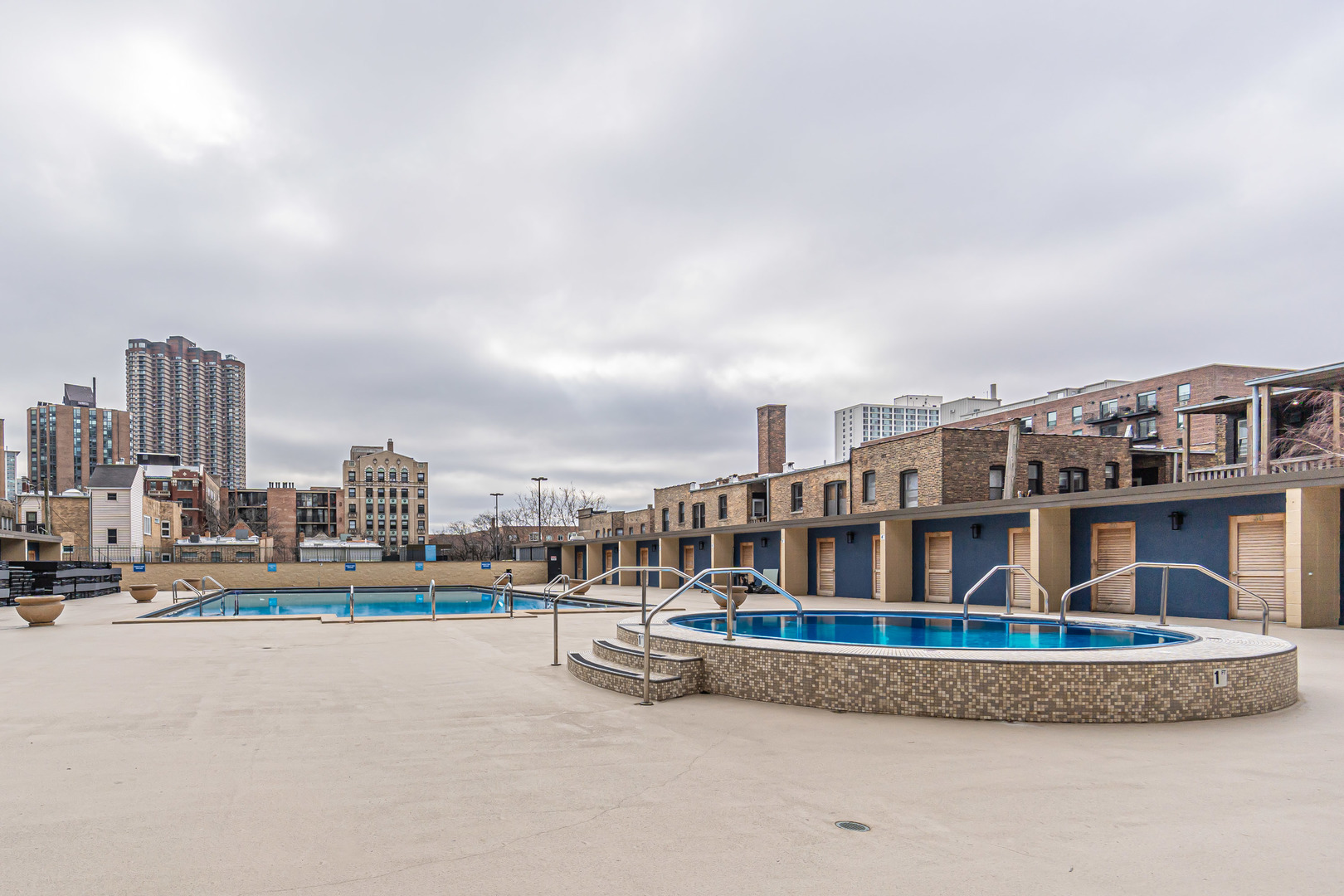 655 West Irving Park Road, Unit 3305 Chicago, IL 60613 - Photo 13 of 14 a view of tall buildings and a big yard