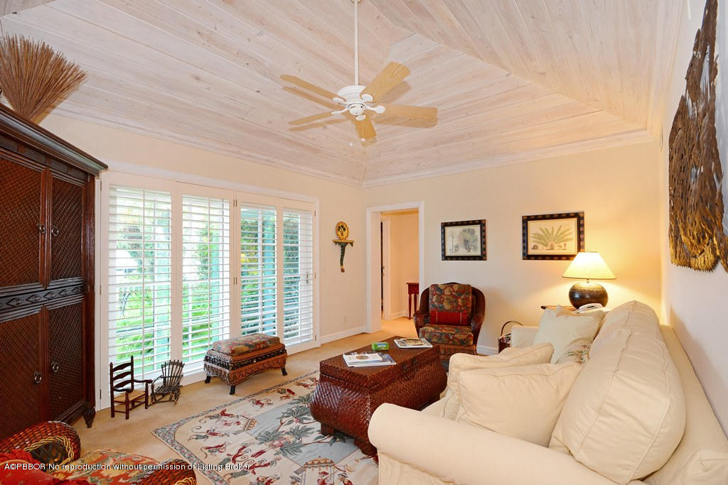 400 Caribbean Road Palm Beach, FL 33480 - Photo 15 of 45 a living room with furniture and a window