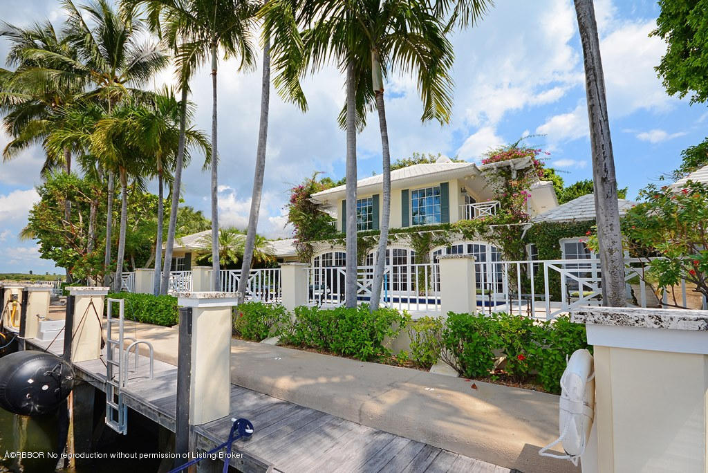 400 Caribbean Road Palm Beach, FL 33480 - Photo 21 of 45 a view of a yard with a fountain