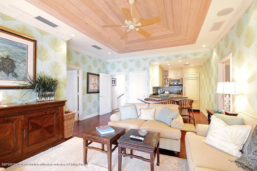 400 Caribbean Road Palm Beach, FL 33480 - Photo 23 of 45 a living room with furniture and a chandelier