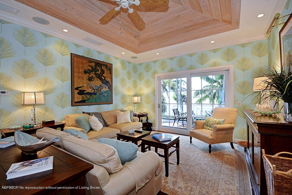400 Caribbean Road Palm Beach, FL 33480 - Photo 24 of 45 a living room with furniture and a large window