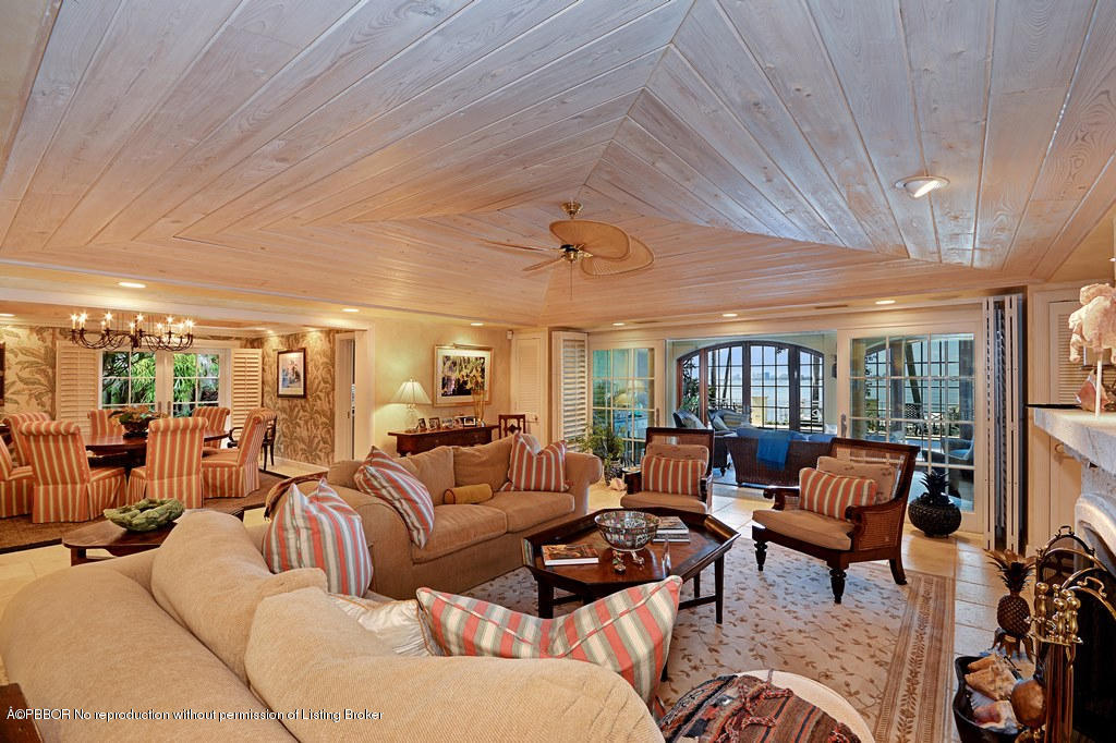 400 Caribbean Road Palm Beach, FL 33480 - Photo 4 of 45 a living room with furniture and a large window