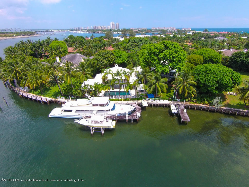 400 Caribbean Road Palm Beach, FL 33480 - Photo 31 of 45 a view of a lake with an outdoor space