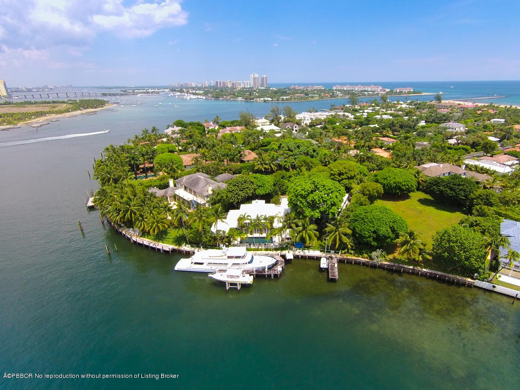 400 Caribbean Road Palm Beach, FL 33480 - Photo 32 of 45 a view of a lake with a city